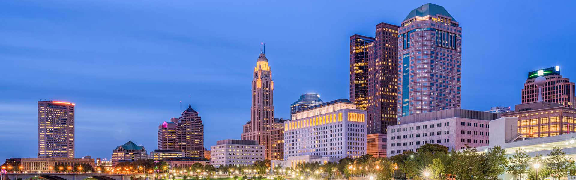 Neon color image of a band playing and people singing along