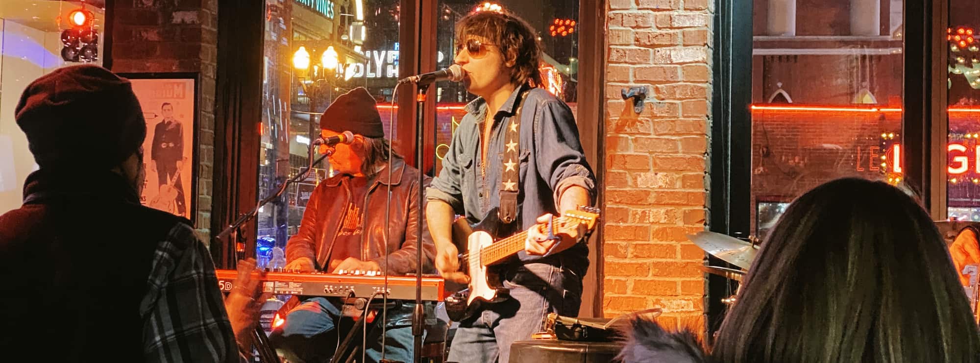 bar singer on guitar in Columbus