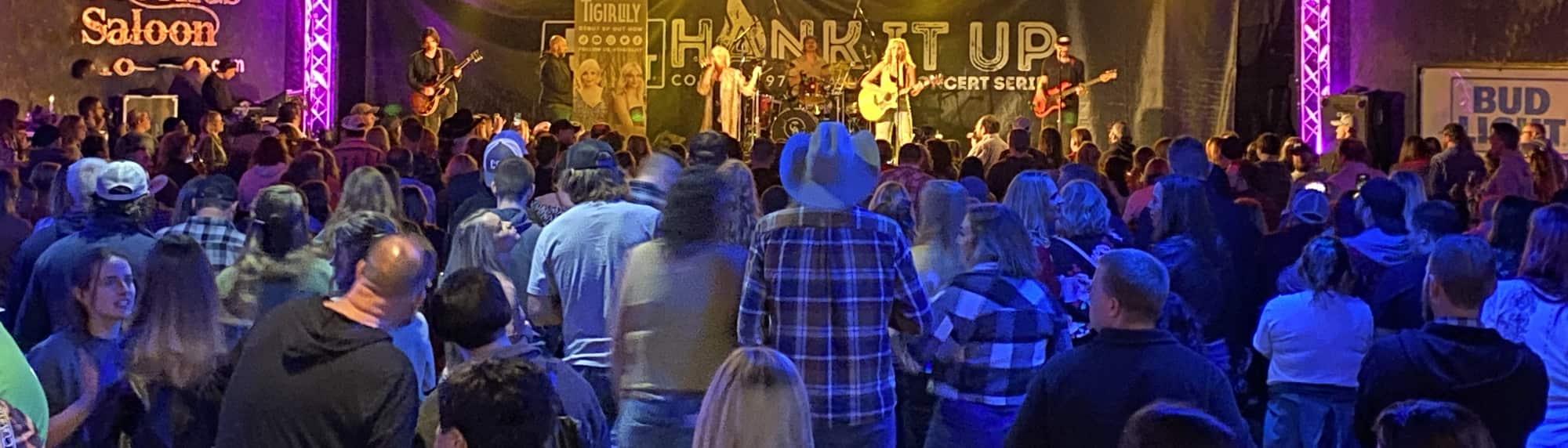 country concert with fans wearing cowboy hats Columbus
